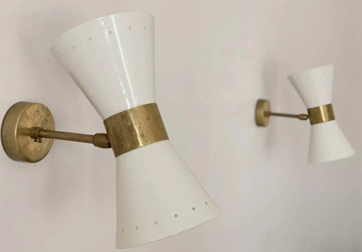 Pair of ivory white diabolo wall lights