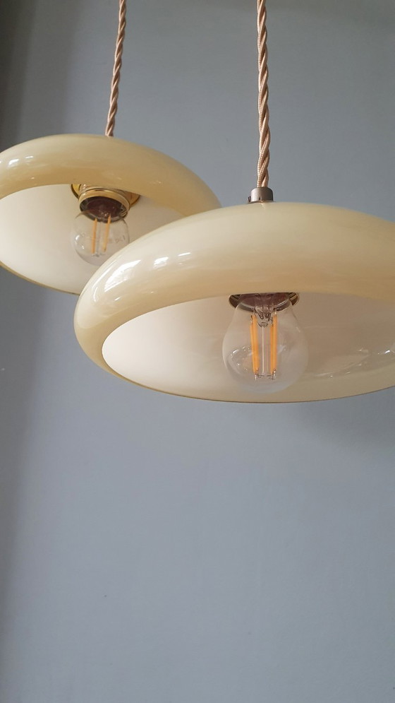 Image 1 of Vintage French pendant lamp set - of pastel yellow opaline glass.