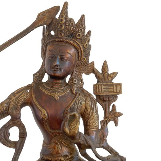 Antigua estatua tibetana de bronce de Manjushri con rastros de dorado lote 170 – Esculturas, Bronze (photo 9 of 15)