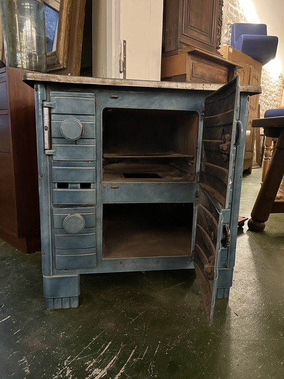 Image 1 of Piccola stufa a legna in ghisa smaltata