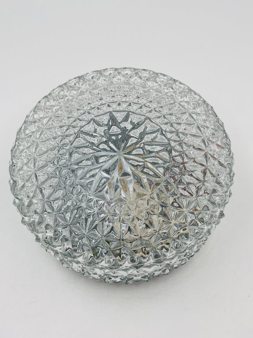 Moulded glass ceiling light with starburst decoration