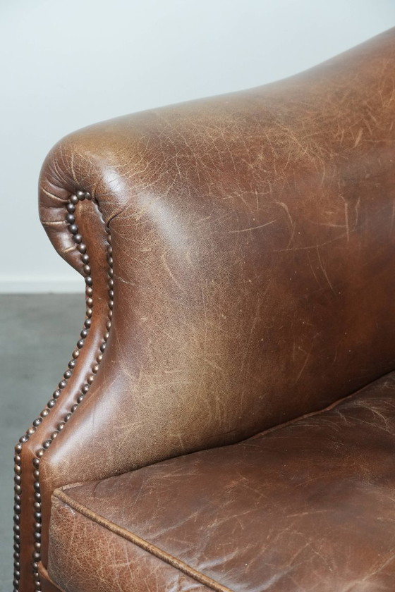 Image 1 of cognac kleurige vintage rundleren clubfauteuil in Engelse stijl 