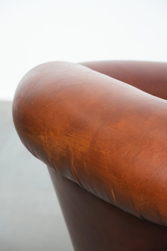 Image 1 of Vintage schapenleren clubfauteuil met siernagels