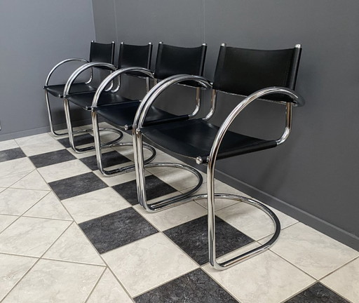 set van 4 Italiaanse stoelen van chroom en leer