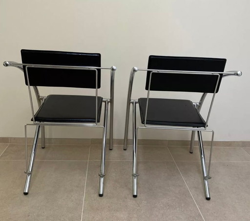 Lot de 2 chaises design vintage en chrome et cuir