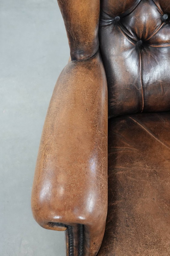 Image 1 of Unique large English-style sheepskin Chesterfield wing armchair