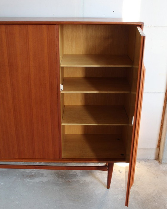 Image 1 of XXL teak highboard, German design classic by Heinrich Rietsenpatt