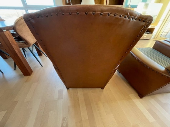 Image 1 of Mid 1900 lederen fauteuils