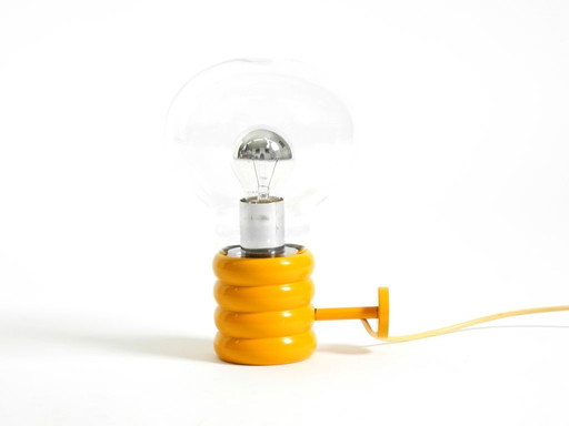 Very rare original 1960s Space Age "Bulb" wall lamp by Ingo Maurer in yellow with a clear glass shade