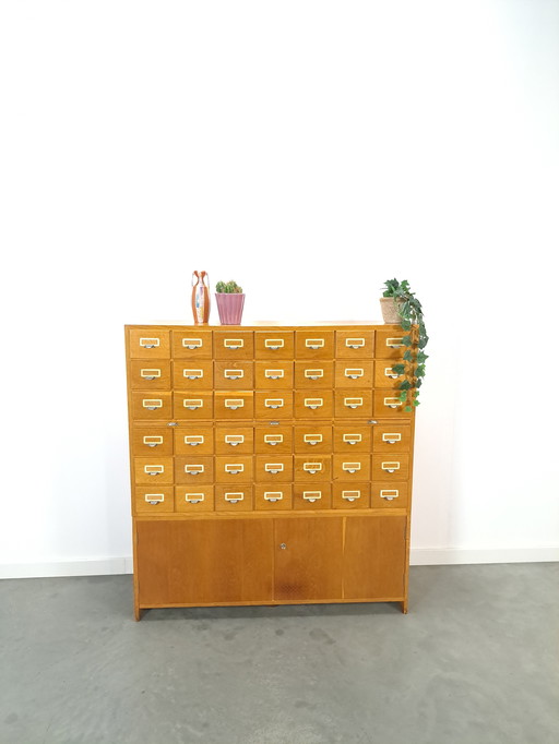 Old wooden chest of drawers with extendable shelves vintage