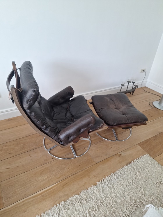 Image 1 of Originele Falcon Chair & Ottoman – Sigurd Ressell (Zeldzame Chromen Spakenvoet)