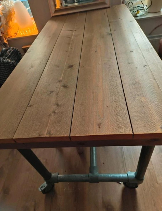 Image 1 of Beautiful scaffolding wood industrial table on wheels