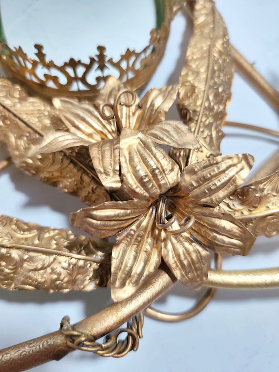 Image 1 of Oval Brass Mirror. Spain, 1940s.