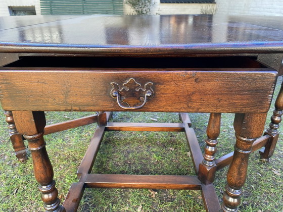 Image 1 of Antique English gateleg table, solid wood, oval, extendable