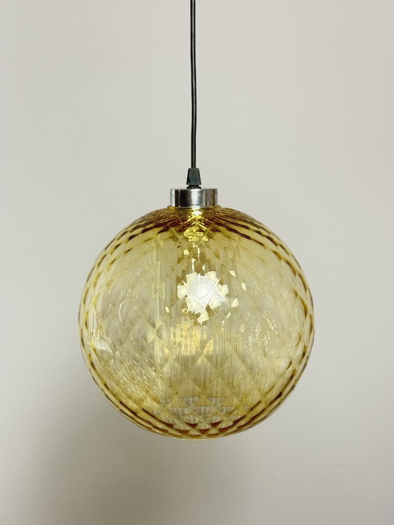 Image 1 of Mid-Century Design Amber Glass Globe Pendant Lamp. Germany, 1960s