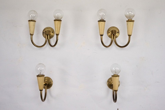 Image 1 of Set di quattro appliques di metà secolo in lacca e ottone. Italia anni '50