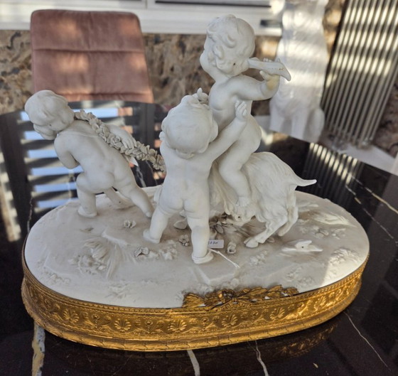 Image 1 of Sculpture - Biscuit - Groupe avec Puttis et bouc de la fin du 19ème siècle (ref 3770)