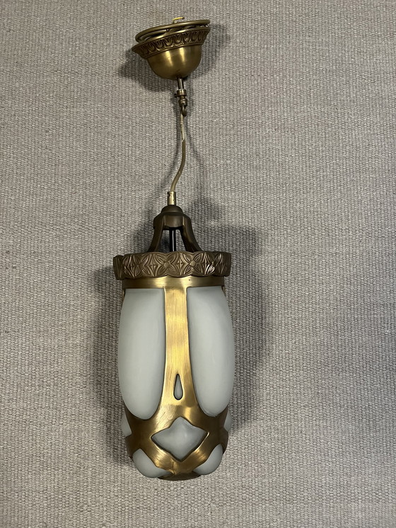 Image 1 of Vladimir Kriatkow lamp, bronze with milk glass, hand-blown using a traditional technique. Made in India.