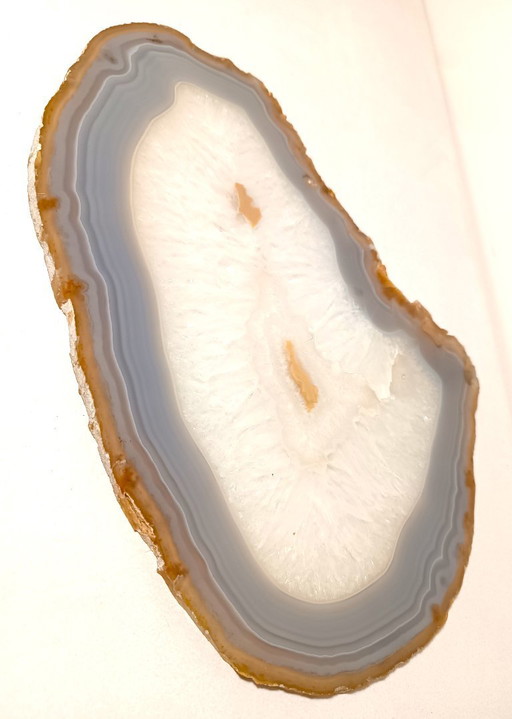 Large agate disc with transparent crystallization