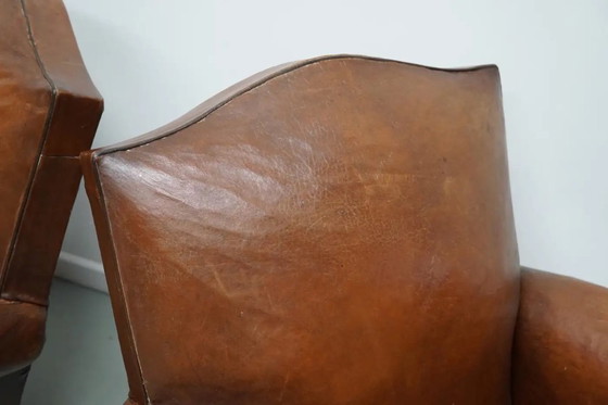 Image 1 of Coppia di poltrone da club francesi in pelle color cognac con schienali a baffo, anni '40