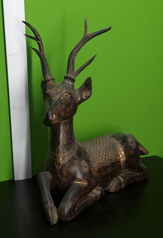 Image 1 of Hölzerne liegende Hirsche