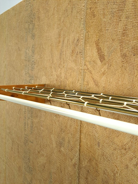 Image 1 of Coat rack from Sweden gold with wood, no. 11