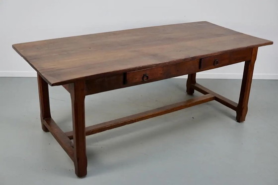 Image 1 of Early 20th-century French rustic country dining table made of oak and elm