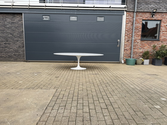 Image 1 of Original oval Knoll Tulip dining table (244cm) Carrara marble