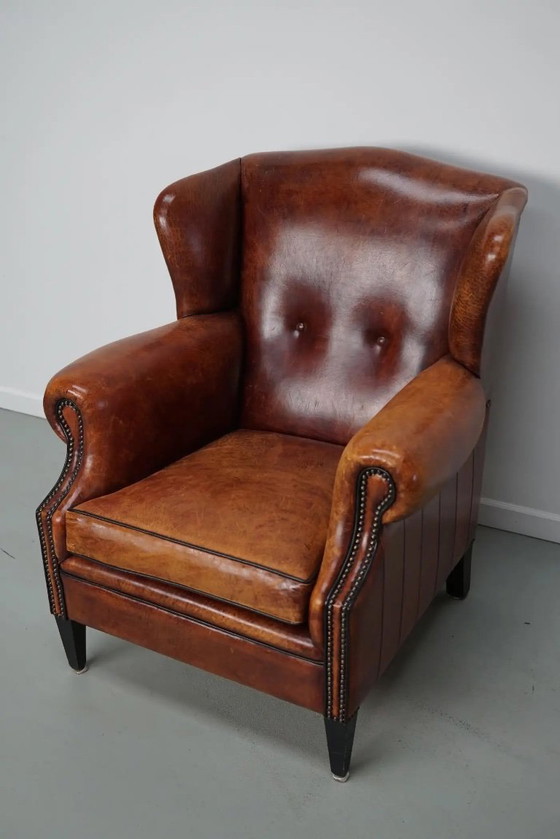 Image 1 of Vintage Nederlandse clubfauteuil in cognackleurig leer