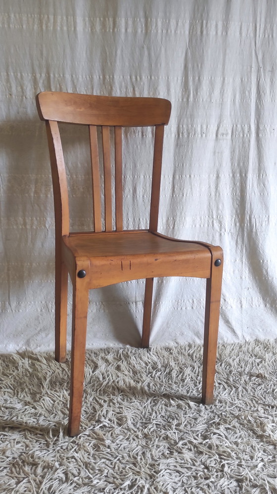 Image 1 of Chaise en bois massif par Stella - années 50/60