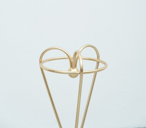 Image 1 of Paragüero de latón y hierro fundido (años 50)