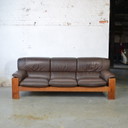 1x 3 seat leather couch in wooden frame