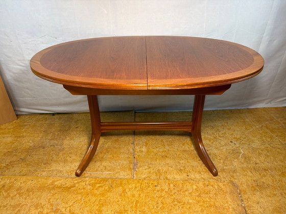 Image 1 of Mid-Century Retro Vintage Teak Extending Dining Table by Nathan 1960s  Seats Up to Six • Stylish & Practical • British Design Cl