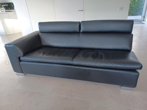 Image 1 of Leolux sofa set, model Howlazy, in black aniline leather and polished aluminum legs.