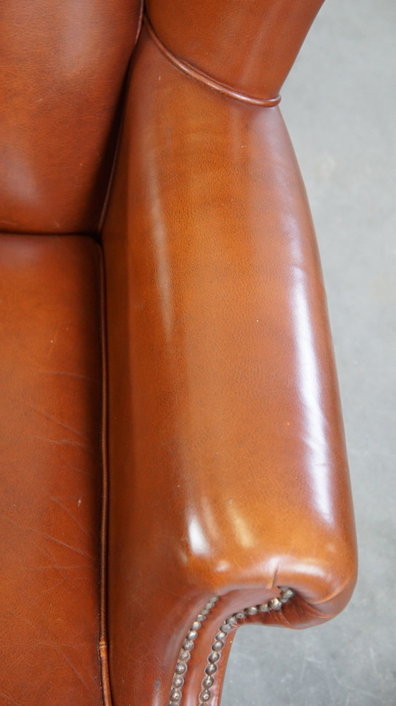 Image 1 of Fauteuil à oreilles en cuir de boeuf