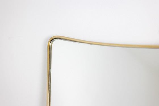 Image 1 of Coppia di specchi stretti in ottone dorato. Circa 1970.