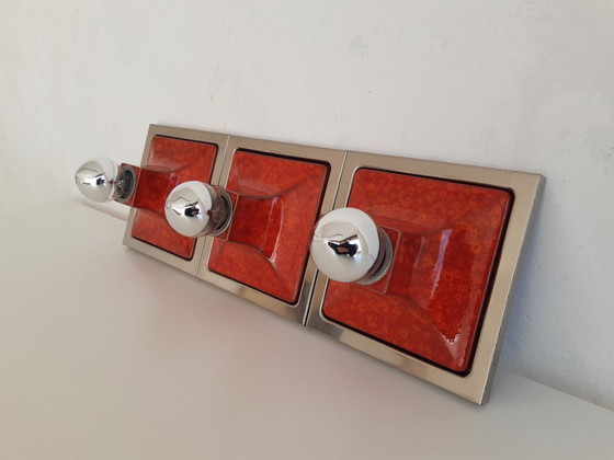 Image 1 of Set of 3 orange ceramic MCM wall lights, wall scones in chrome frame