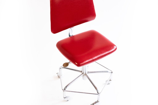 Red vintage swivel chair