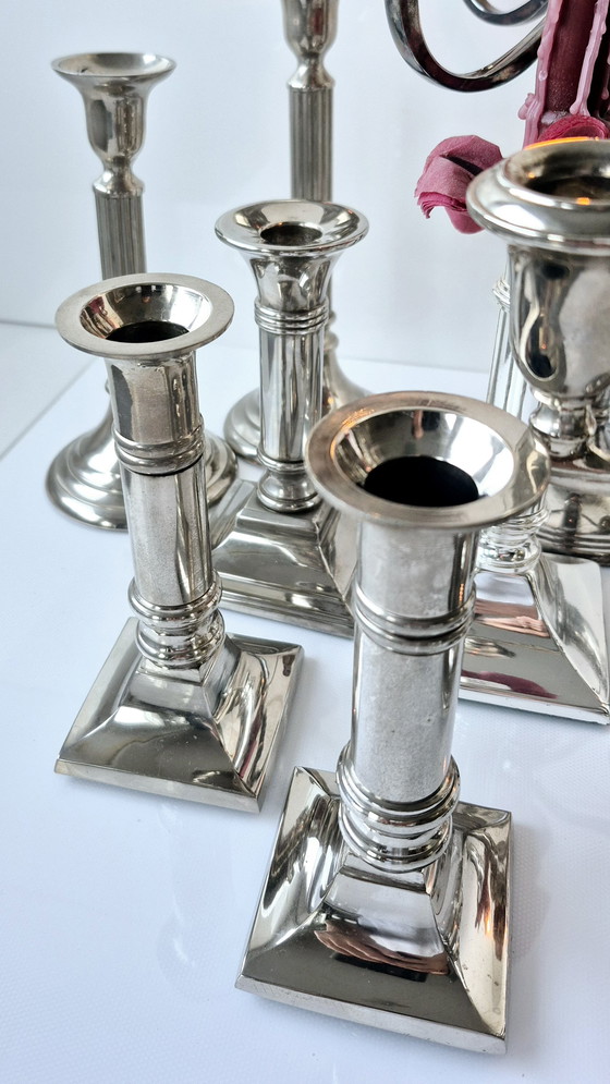 Image 1 of Collezione di 11 candelieri vintage placcati in argento (ottone) di varie epoche