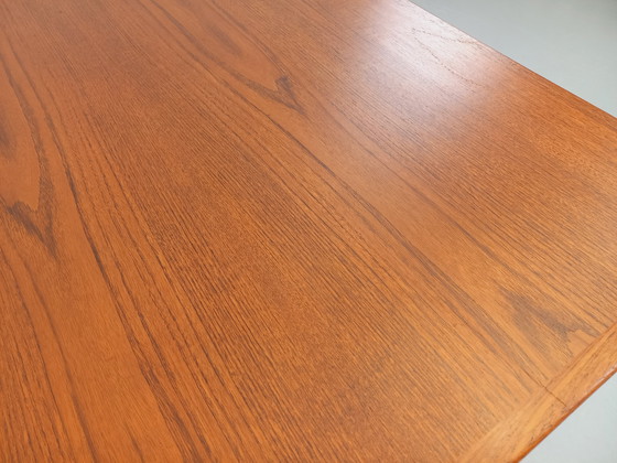 Image 1 of Scandinavian rectangular vintage dining table by Johannes Andersen for Samcom from the 60s in teak with integrated extensions