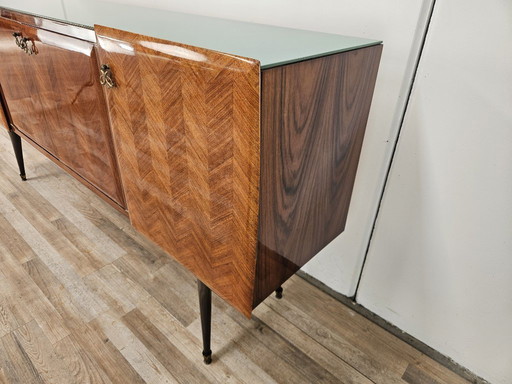 Mahogany-clad sideboard with glass top