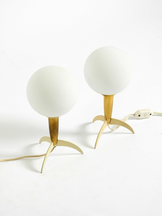 Image 1 of Two Mid-Century Modern rocket table lamps in brass and glass