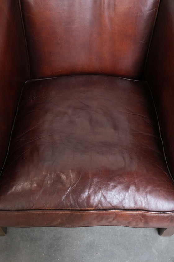 Image 1 of 2 x Vintage schapenleren clubfauteuil met siernagels 