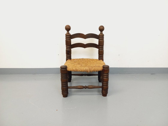 Image 1 of Vintage Charles Dudouyt Brutalist lage stoel in hout en stro uit de jaren 40