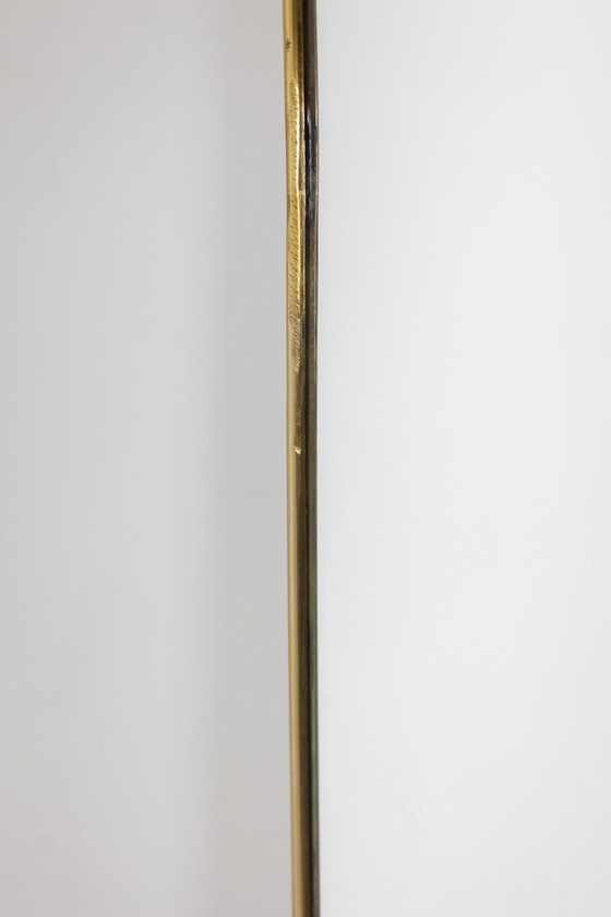 Image 1 of Coppia di specchi stretti in ottone dorato. Circa 1970.