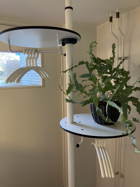 Image 1 of Designer coat rack, portable and height-adjustable so that it fits between ceiling and floor.