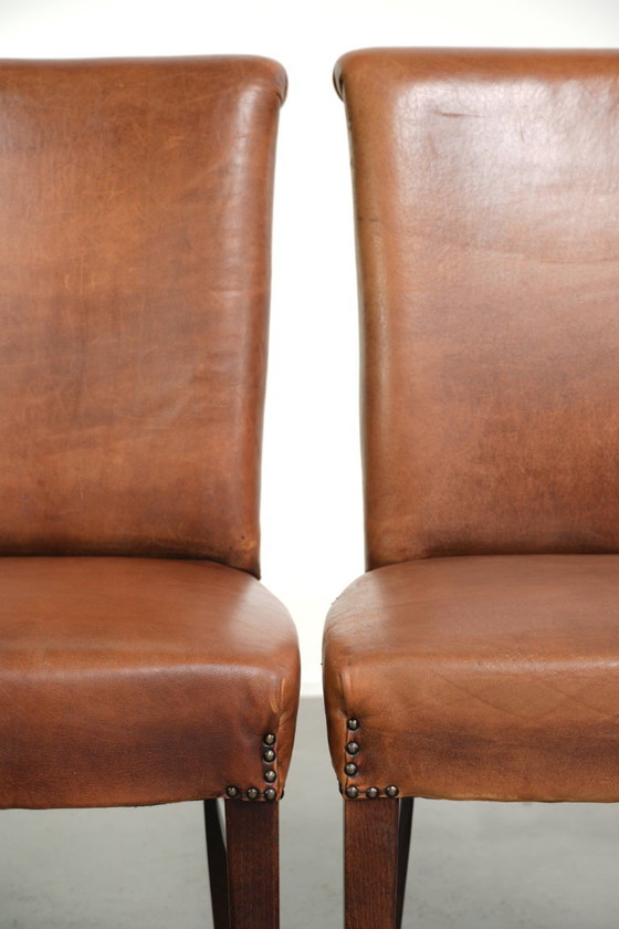 6x Begeerlijke schapenleren eetkamerstoel in een mooie cognac kleur met een mooi patina – Eetkamerstoelen (photo 12 of 17)