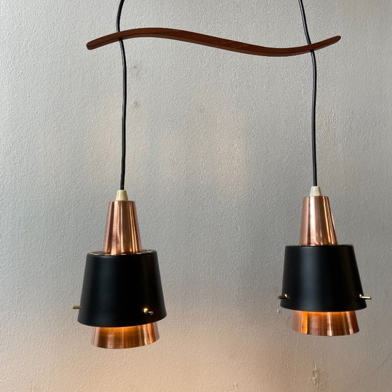 Image 1 of Danish vintage double pendant lamp with teak – in the style of Bent Karlby