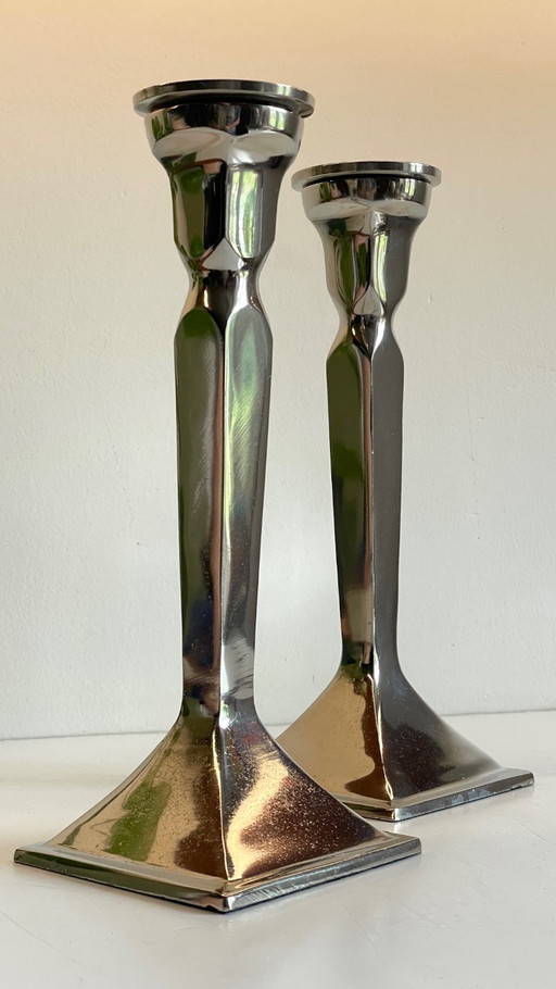 Pair of vintage chrome-plated cast aluminium candlesticks