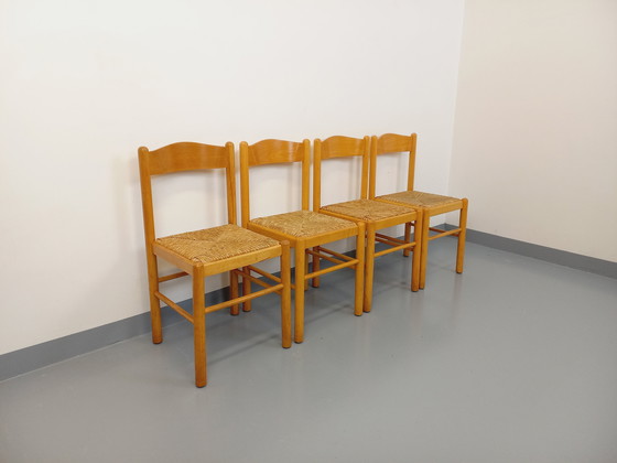 Image 1 of Suite van 4 Vintage Brutalistische stoelen in licht hout en stro uit de jaren 70 en 80